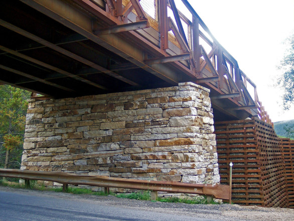 Stan Miller Excavating, Breckenridge, CO. Masonry Installation: Gallegos Corporation, Vail, CO. Description: Unique slab style veneer, custom chiseled, Sienna Buff and Grey.