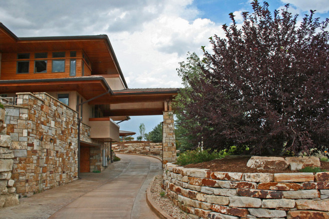 Wall Installation and Description: Right is Wall Slabs 8 – 14” think, machine installed by A1 Lawn & Landscape, Pueblo West, CO. Left is Custom Split Siloam Veneer installed by Mountain Masonry, Canon City, CO.